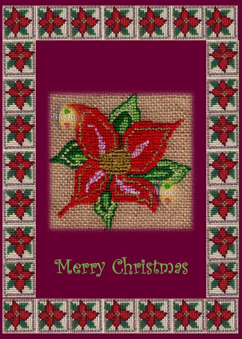 Photographic print of a festive Christmas card featuring a large red poinsettia with green leaves at the center, designed in a cross-stitch style on a burlap-like background. The flower is framed by a maroon border and a decorative outer edge of smaller poinsettias on a beige background. At the bottom, “Merry Christmas” is written in playful green letters.